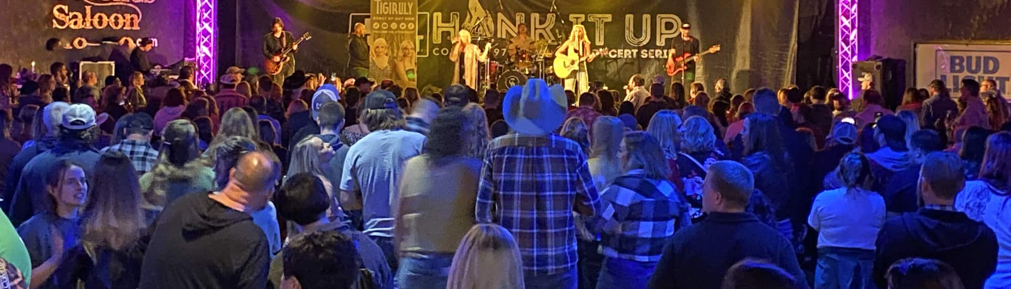 country concert with fans wearing cowboy hats San Francisco